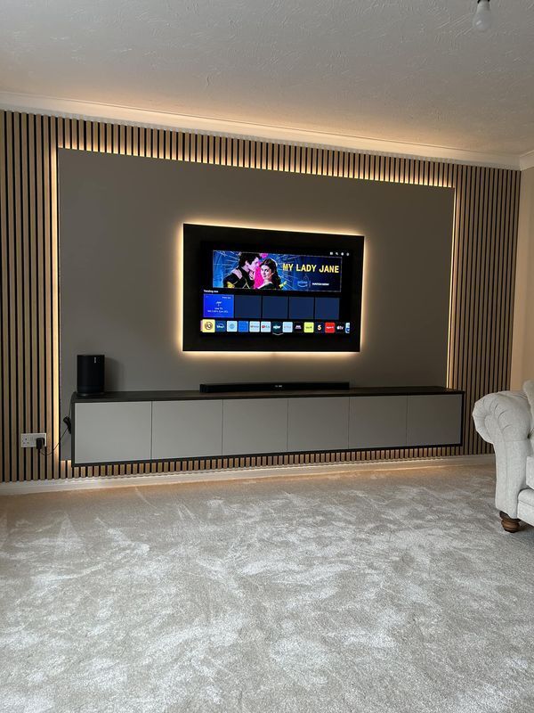 Architectural Slat Media Modern Wall Design With Ambient Lighting and Floating Storage